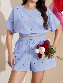 Comfylo Bộ đồ đôi cỡ lớn dành cho kỳ nghỉ hè, áo sơ mi và quần short kẻ sọc dáng cánh dơi, thích hợp cho ngày lễ tình nhân. Bộ đồ nữ in hình trái tim, bộ đồ kẻ sọc, bộ đồ hai mảnh, bộ đồ in hình trái tim, bộ đồ hai mảnh cho nữ, bộ đồ ngắn kẻ sọc in hình trái tim, bộ đồ ngắn màu xanh dương, bộ đồ mặc nhà hai mảnh, bộ đồ ngắn hai mảnh cho nữ, bộ đồ phối hợp cho mùa hè. - Xanh và trắng - Xem 6