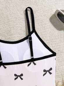 SHEIN Tween Girl Bow Tie Print One-Piece Swimsuit, Summer Beach Vacation One Piece Swimsuit Bow Bathing Suit Swimsuit With Bows Bow Print Swimsuit Kids Bathing Suit White Bathing Suit White One Piece Swimsuit Bodysuit For Teen Girl 13 Year Old Girl Swimsuit Girl Swimwear Swimwear For Girls 8 Tweens Swimsuit Bows Kids Swimsuits Bathing Suits For Girls Girl Swimsuits Kids One Piece Swimsuit Tween One Piece Suit - Black and White - View 4