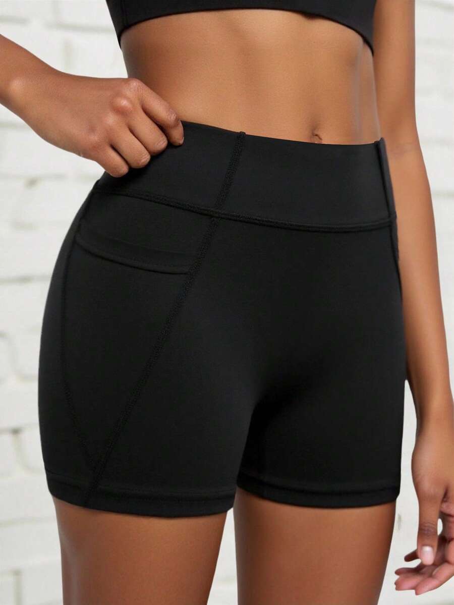 Black Athletic Shorts For Tween Girls, Featuring A Creative Paneled Construction With Functional Side Pockets, Made From High-Stretch Comfortable Fabric For Unrestricted Movement, Ideal For Cycling, Jogging, Yoga Sessions, And Versatile Training Activities - Black - View 1