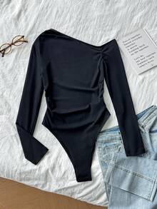 Tseoso 95% 纯棉黑色修身单肩长袖连体衣，秋冬完美之选。性感百搭，基本款，适合所有季节；复古、柔美女孩、居家、返校、秋季衣橱；简约、时尚；舒适、别致。 - 彩色 - 查看 2