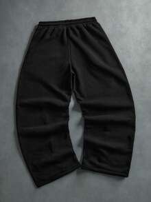 STYNVO Pantaloni de trening bărbătești, casual, lejeri, cu imprimeu grafic, cu picior larg, potriviți pentru ținute streetwear, ținute casual zilnice, ieșiri în weekend, festivaluri de muzică, întâlniri sociale și alte ocazii speciale pentru tineri. Acești pantaloni sunt o piesă vestimentară versatilă indispensabilă în garderoba bărbaților, fiind un cadou excelent pentru iubiți sau soți. - Negru - Vizualizare 2