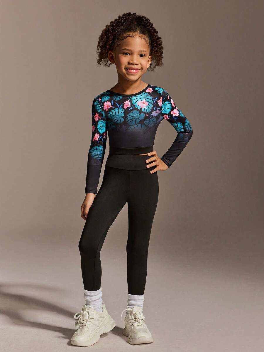 SHEIN Ensemble de survêtement pour jeunes filles, pantalon à manches longues avec motif noir. Tenue de sport ajustée, à la mode, en tissu haute élasticité. Convient pour le cyclisme, le jogging et les jeux de ballon en extérieur. - Noir - Voir 1