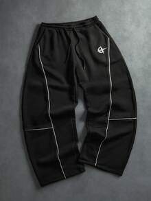 STYNVO Pantaloni de trening bărbătești, casual, lejeri, cu imprimeu grafic, cu picior larg, potriviți pentru ținute streetwear, ținute casual zilnice, ieșiri în weekend, festivaluri de muzică, întâlniri sociale și alte ocazii speciale pentru tineri. Acești pantaloni sunt o piesă vestimentară versatilă indispensabilă în garderoba bărbaților, fiind un cadou excelent pentru iubiți sau soți. - Negru - Vizualizare 3