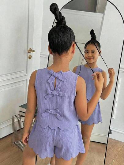SHEIN Conjunto de top sin mangas con cuello redondo y decoración de lazo en la espalda, y shorts casuales y minimalistas cómodos para niña preadolescente