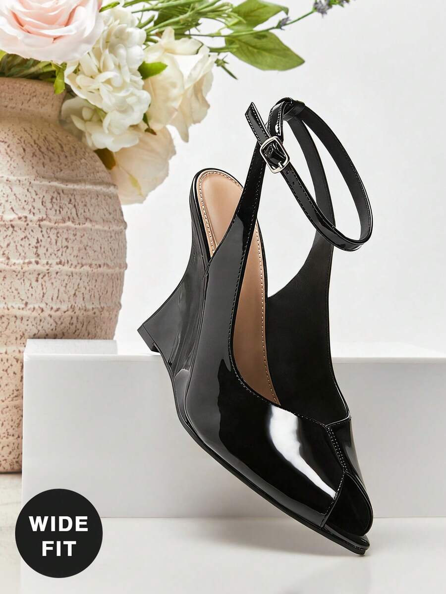 SHUZIA Women's Wide-Fit Peep Toe Ankle Strap Wedge Sandals - Black - View 1