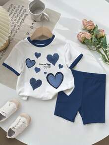 SHEIN Set di maglietta a maniche corte e pantaloncini da bambina, stile casual e carino, con motivo a cuore, adatto per vacanze, collo rotondo - Multicolore - Visualizzare 3