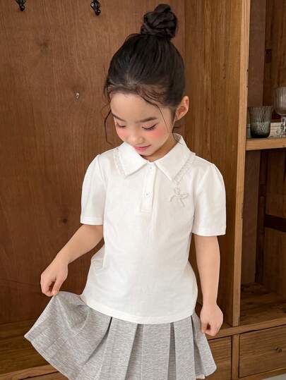 Dazy Kids 年轻女孩夏季休闲通勤简约百搭学院风纯色泡泡短袖Polo衫，饰有仿珍珠蝴蝶结