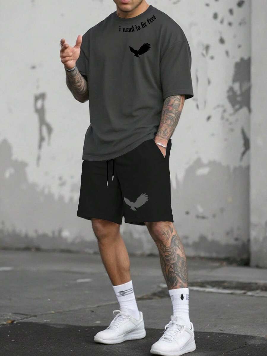 Manfinity LEGND Bộ đồ nam thường ngày phong cách đường phố in hình chim và khẩu hiệu gồm áo thun và quần short cạp chun, bộ đồ hai mảnh phong cách hip hop mùa hè gồm quần short và áo thun oversized, bộ đồ tập gym hai mảnh gồm quần short dài và áo thun nam, áo thun nam phong cách đường phố. - Nhiều màu - Xem 1
