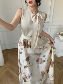 Bộ đồ 2 món thanh lịch dành cho nữ: Áo sơ mi cổ nơ buộc dây màu mơ và chân váy organza in họa tiết. - Màu be - Xem 3