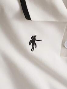 GlowEve Top sin mangas de punto con cuello polo, bordado y de colores contrastantes - Blanco - Ver 5