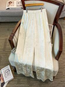 GlowEve CURVE Quần ống rộng thường ngày bằng vải jacquard có túi lưng thun co giãn cho nữ cỡ lớn - Màu be - Xem 1
