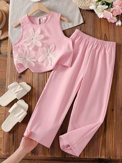 SHEIN Vintaside Kids Girls And Adults A Two Pieces Set Of Pink Round-Neck Sleeveless Tank Top And Straight-Leg Trousers For Summer, Fashionable, Versatile, Cute, Gentle And Style. The Woven Fabric Is Of Moderate Thickness And Fits Well. The Three-Dimensional Petal Design Adds A Sense Of Refinement And Ceremony. It Is Suitable For Daily Outings, Afternoon Tea With Best Friends, Home Relaxation, Attending Weddings, Birthday Parties, Etc