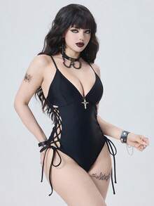 ROMWE Women's Sexy European And American Music Festival Party Bold And Avant-Garde Outdoor Gothic Punk Apocalyptic Style Basic Versatile Solid Color Thin Strap Deep V-Neck Metal Cross Pendant Decorated Side Criss-Cross Tie-Up Waist Cutout Backless One-Piece Swimsuit, Slimming Design, Suitable For Beaches, Seaside, Autumn Swimwear, And Also Suitable For Spring Break Music Festivals. Swimming Goth One Piece Swimsuit Curve Swimsuits Gothic SwimwearFigure-Hugging Swimwear, Gothic-Style Swimwear. Goth Swimsuit Emo Bathing Suit Lace-Up Swimsuit Goth Bathing Suit - Black - View 1