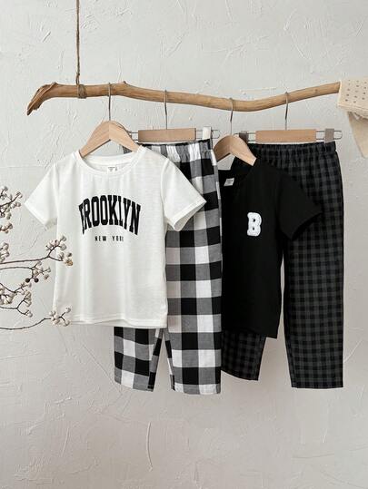 Set de 2 piezas de pijama para niño pequeño con camiseta de manga corta de cuello redondo con estampado de letra minimalista suave y cómoda + pantalón holgado de estampado a cuadros, adecuado para el hogar, exterior, primavera/verano