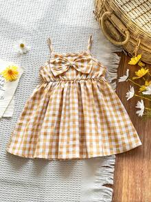 SHEIN Vintaside Kids 女童时尚优雅可爱休闲纯红色无袖中长连衣裙，舒适梭织面料，饰有3D超大蝴蝶结，春夏新品，适合生日派对、日常穿着、户外活动和度假。 - 黃色 - 查看 3