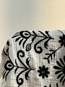 GalTyme Bộ đồ 2 mảnh dành cho nữ cỡ lớn: áo cổ chữ V sâu, thêu hoa, buộc dây phía trước và chân váy ngắn, thích hợp cho kỳ nghỉ hoặc du lịch. - Đen và trắng - Xem 10