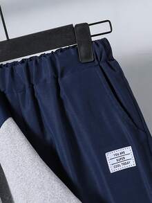 SHEIN Vacaura 两件套休闲时尚简约蓝灰白拼接T恤裤套装，适合青少年男孩，宽松版型，适合秋季、春季、夏季日常穿着、通勤、户外活动、运动、上学、街头风、派对和拍照等场合。 - 彩色 - 查看 3