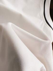GlowEve Top sin mangas de punto con cuello polo, bordado y de colores contrastantes - Blanco - Ver 8