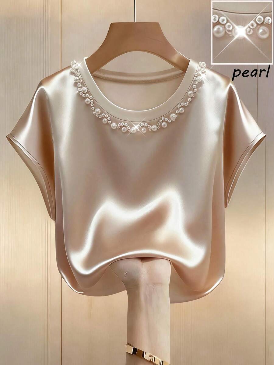 Franclia Französischer Stil elegantes rundhalsiges schlankemachendes welliges florales perlenverziertes kurzärmeliges apricotfarbenes glänzendes Strick-T-Shirt für Frauen, Sommer Mode T-Shirt, Party Top, Ausgangs-Top für Frauen, elegantes Top für Frauen, lässiges Top für Frauen, perlenverziertes elegantes Satinoberteil - Aprikosenfarben - Übersicht 1