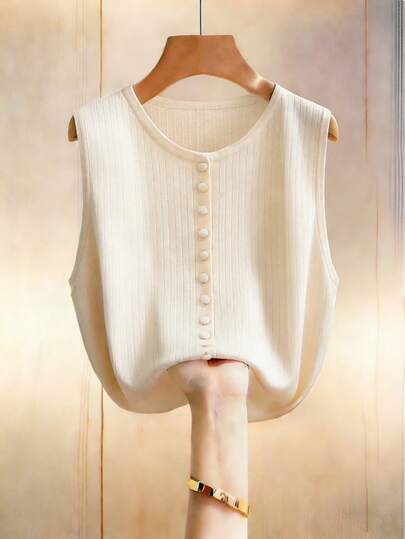 Franclia Nouveau cardigan sans manches côtelé beige, style minimaliste décontracté et ample, col rond. Style rétro français pour le layering, élégant pour le trajet, le travail et le port quotidien. Silhouette cylindrique vintage, polyvalent et sophistiqué. Design romantique et .