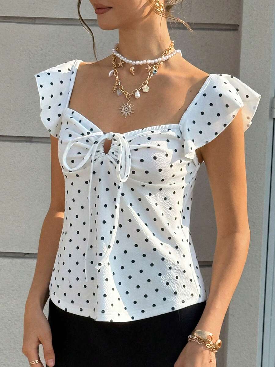 Cévolie Black Polka Dot V-Neck Bowknot Cap Sleeve Top Polka Dot Top - White - View 1