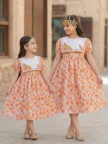 年轻女孩优雅印花泡泡袖圆领连衣裙