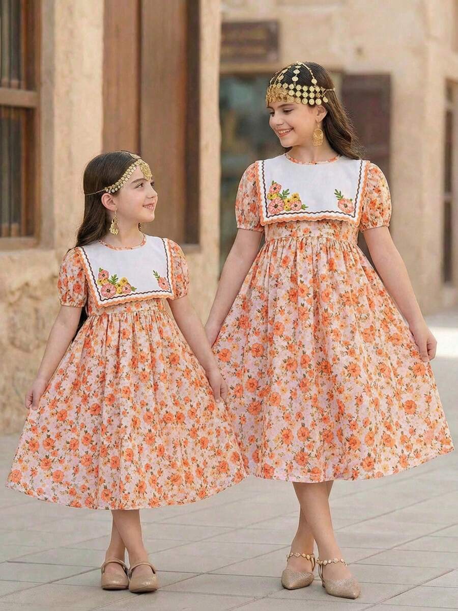 年轻女孩优雅印花泡泡袖圆领连衣裙