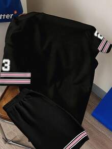 Manfinity Joysei Bộ đồ nam gồm áo thun ngắn tay cổ tròn in chữ và số, kết hợp với quần short cạp chun có dây rút, thích hợp mặc thường ngày. - Nhiều màu - Xem 2