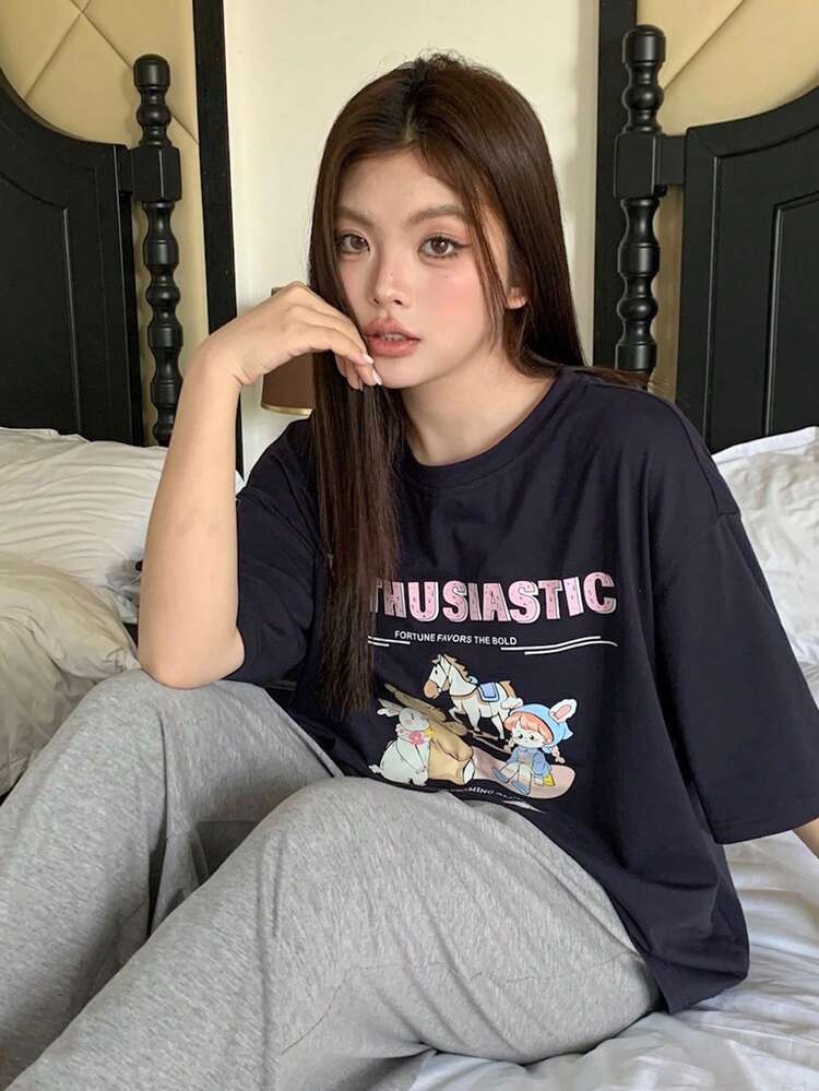 Dazy Plus Plus Size Women Casual Graphic Print Pajama Set, Loose Fit Cartoon Short Sleeve Top And Solid Color Straight Pants, Sleepwear