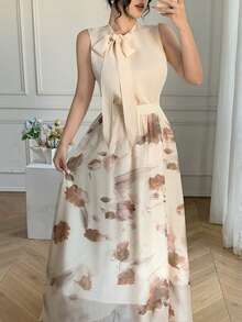 Bộ đồ 2 món thanh lịch dành cho nữ: Áo sơ mi cổ nơ buộc dây màu mơ và chân váy organza in họa tiết. - Màu be - Xem 1