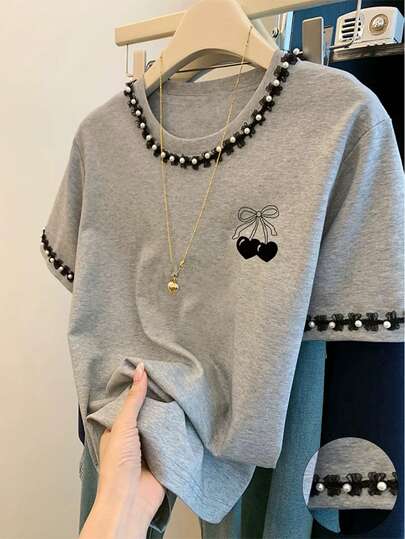 Resyla Camiseta de mujer de cuello redondo de manga corta minimalista con estampado y decoración de perlas