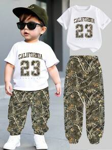 两件套男童休闲简约图案短袖圆领T恤和工装裤套装，适合夏季穿着 - 彩色 - 查看 1