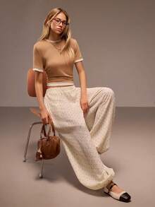 Muvela 2026春夏新款奶油黄黑波点印花可调节松紧腰带侧袋抽绳灯笼裤，时尚优雅，适合狂欢节派对、复古英伦风、返校季、音乐节、都市通勤等场合。 - 白色 - 查看 1