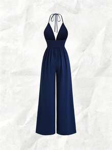 Olithes Bộ jumpsuit phong cách Bohemian hở lưng, cạp cao, ống rộng, viền tua rua đính hạt, cổ chữ V khoét sâu, dáng suông thoải mái, thích hợp mặc đi biển trong kỳ nghỉ. - Màu xanh hải quân - Xem 2