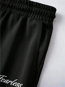 Manfinity Joysei Bộ đồ nam gồm áo thun ngắn tay cổ tròn in chữ và số, kết hợp với quần short cạp chun có dây rút, thích hợp mặc thường ngày. - Nhiều màu - Xem 5