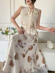Bộ đồ 2 món thanh lịch dành cho nữ: Áo sơ mi cổ nơ buộc dây màu mơ và chân váy organza in họa tiết. - Màu be - Xem 4
