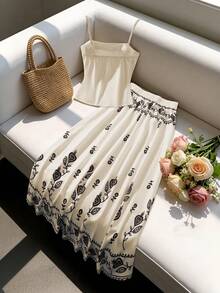 GlowEve Bộ đồ 2 mảnh gồm áo hai dây kiểu corset in hoa và chân váy maxi xòe cạp chun, thích hợp cho nữ đi nghỉ mát mùa hè. - Nhiều màu - Xem 2