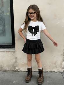 两件套女童蝴蝶结装饰修身短袖T恤和黑色百褶迷你裙，适合春、夏、秋季室内外活动，学院风，黑白撞色，可爱日常穿着 - 白色 - 查看 7