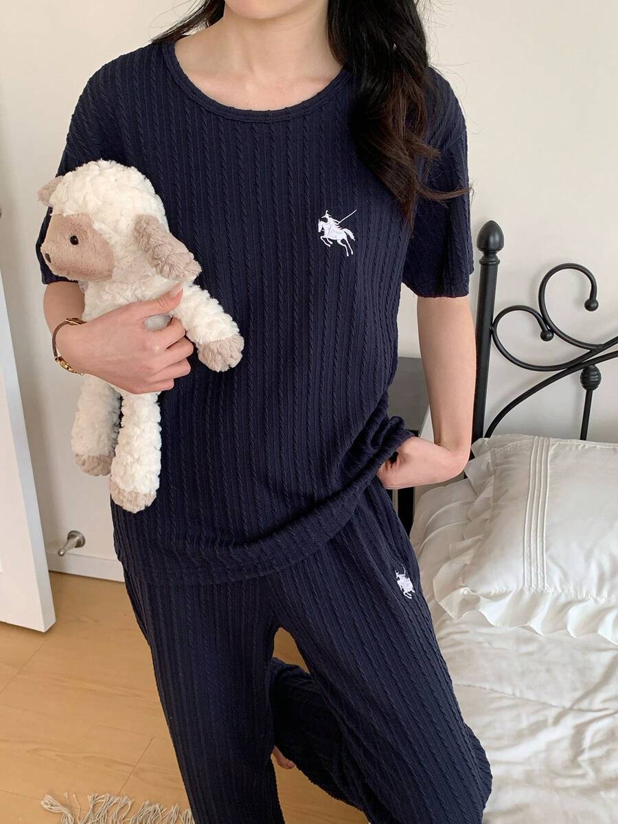 Set de 2 piezas Conjunto informal de moda para adolescentes Tela texturizada azul marino, Blusa de manga corta con gráfico bordado lindo y pantalones de ajuste relajado, Ropa de casa - Azul Marino - Ver 1