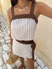 Serisse Bộ đồ 2 mảnh dành cho nữ, gồm áo croptop kẻ sọc buộc dây cổ và chân váy thắt eo. - Nhiều màu - Xem 4