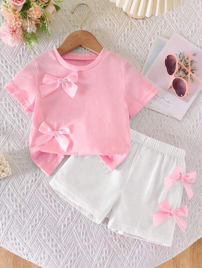 SHEIN 2pcs/Set Girls Casual Cute Daily Round Neck Short Sleeve Cropped Tee With 3D Bow Decor And Elastic Waist Shorts