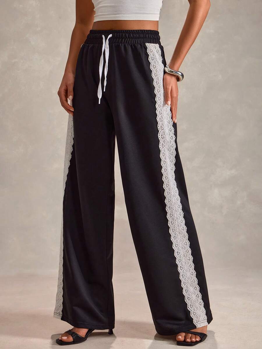 EURMUSE Women Solid Color Side Contrast Detailed Wide Leg Sweatpants - Black - View 1
