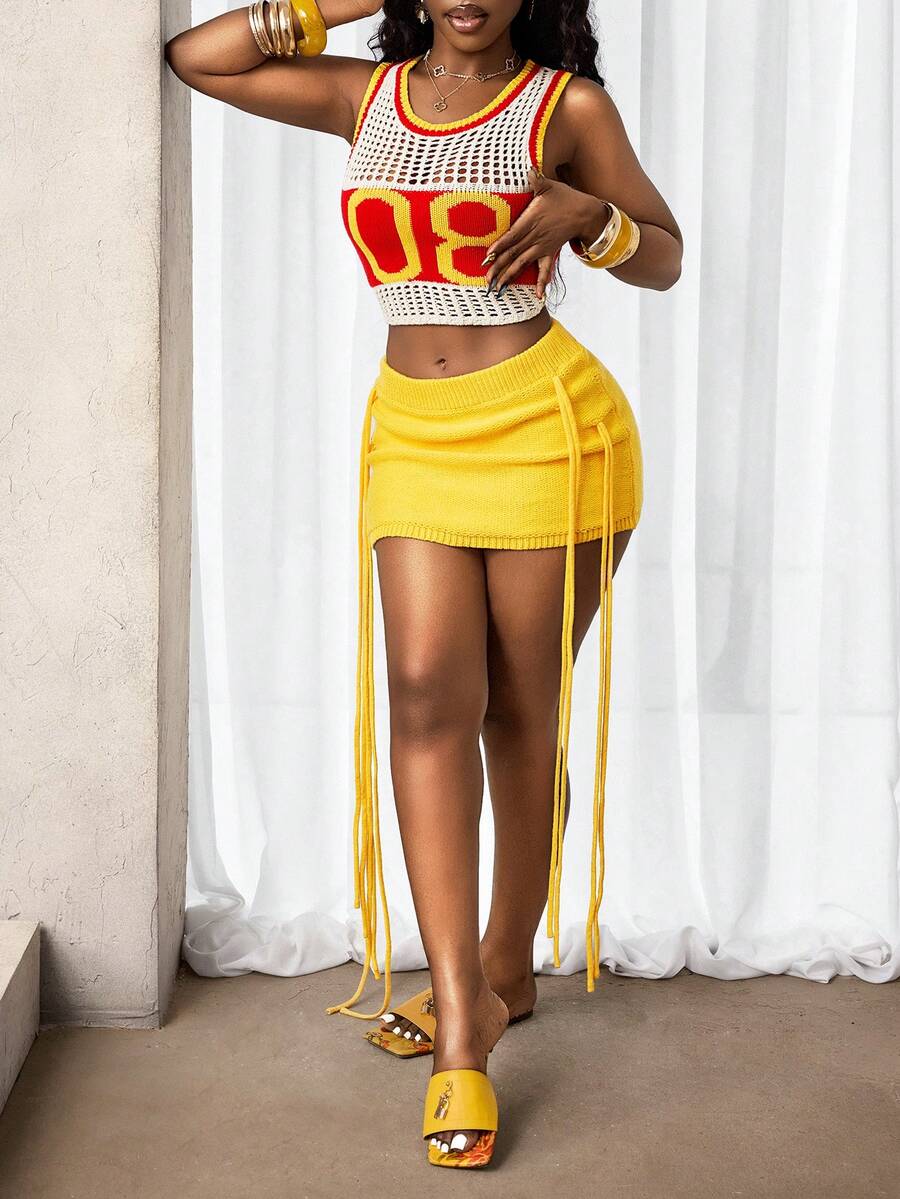 BamGleam Nuevo top deportivo ajustado con rayas huecas y dígitos + falda corta con flecos para mujer - Amarillo - Ver 1