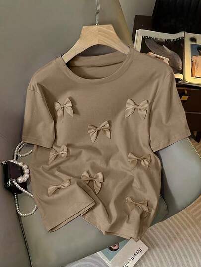 Resyla Camiseta rosa de manga corta con cuello redondo y lazo 3D en forma de H, de estilo casual para mujer, para el verano