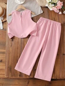SHEIN Vintaside Kids 这款粉色圆领无袖背心搭配直筒裤的两件套，适合女孩和成人夏季穿着，时尚百搭，可爱温柔，尽显气质。面料厚度适中，穿着合身。立体花瓣设计更添精致优雅之感。适合日常外出、与闺蜜下午茶、居家休闲、参加婚礼、生日派对等各种场合。 - 粉色 - 查看 3