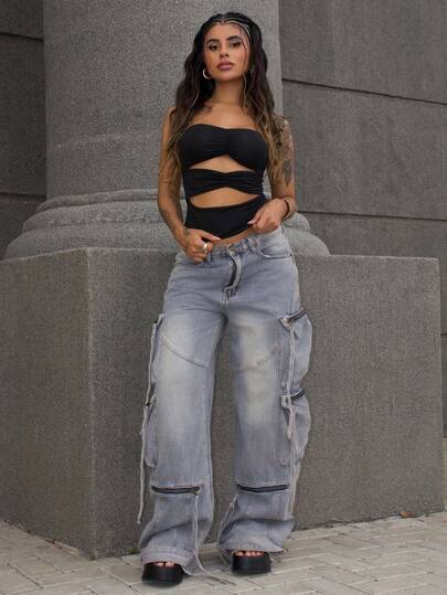 破洞工装牛仔裤，带多个拉链口袋，Y2K 风格阔腿抽绳细节，街头时尚秋冬