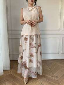 Bộ đồ 2 món thanh lịch dành cho nữ: Áo sơ mi cổ nơ buộc dây màu mơ và chân váy organza in họa tiết. - Màu be - Xem 6