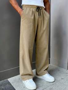 Manfinity Homme Quần nhung kẻ nam dáng rộng, thoải mái, phù hợp cho mặc hàng ngày, đi chơi cuối tuần, du lịch, gặp gỡ bạn bè, v.v. Chiếc quần này là một món đồ thiết yếu đa năng trong tủ quần áo của nam giới và là một món quà tuyệt vời dành cho bạn trai hoặc chồng. Quần nỉ ống rộng nam, quần nỉ có dây rút, quần nỉ ống loe nam, quần jogger kaki nam, thích hợp cho các chuyến đi cuối tuần, hoạt động ngoài trời, du lịch, môi trường làm việc thoải mái hoặc các dịp bán trang trọng, quà tặng cho bạn trai/chồng, quà kỷ niệm/sinh nhật, tiệc tùng, kỳ nghỉ hè, lễ hội, năm mới, đám cưới, ngày Valentine. - Màu Khaki - Xem 1