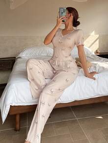 Dream Adore Conjunto de pijama con cuello en V, botones y manga corta con estampado de pestañas de dibujos animados para mujeres - Multicolor - Ver 5