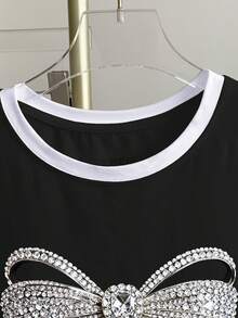 Franclia Camiseta de mujer de manga corta con cuello redondo, estampado de lazos y ribete de contraste - Negro - Ver 3